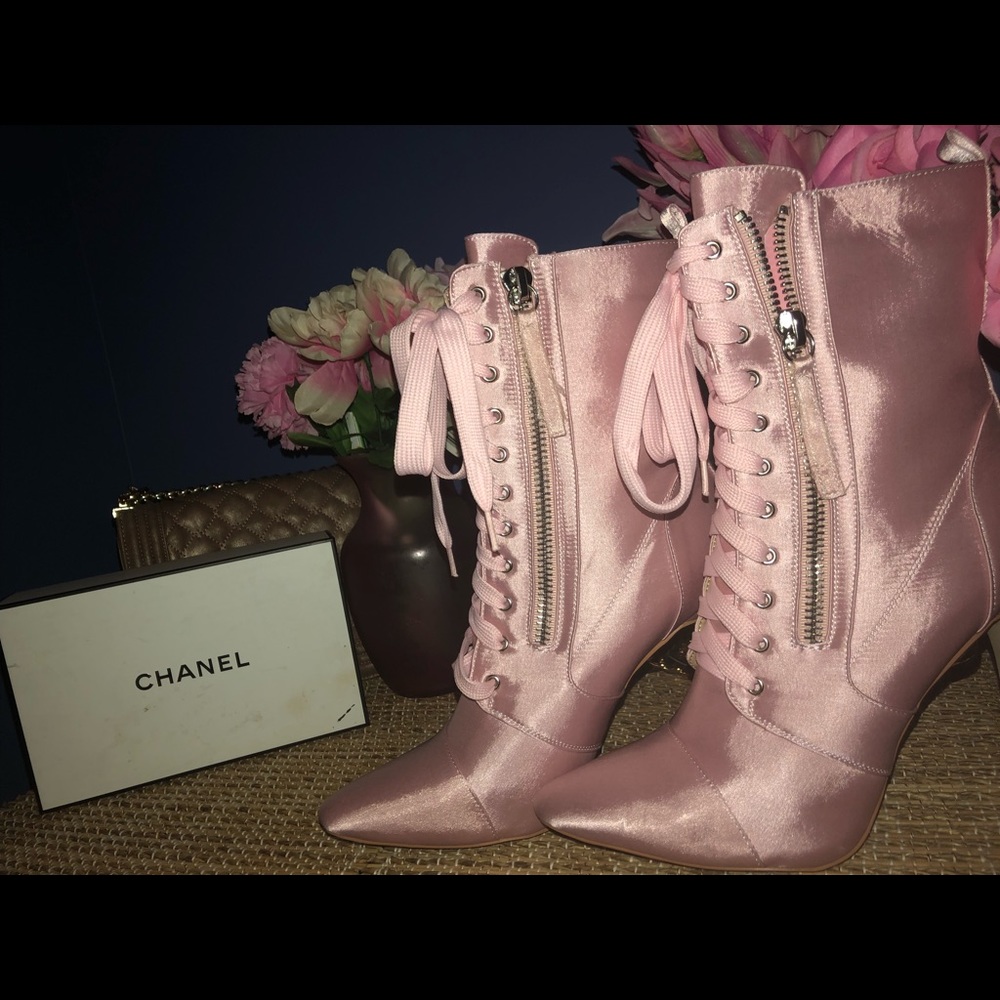 Cloud pink lace up boot heels. Not for sale.